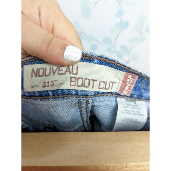 Womens LEVIS 515 Signature Stretch Mid Rise Bootcut Jeans Size 14 M Light Wash - Picture 3 of 13